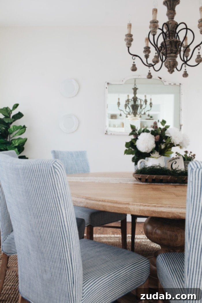 Another wide shot of the French Country Dining Room, emphasizing the harmonious blend of textures and colors, creating a serene and welcoming atmosphere.