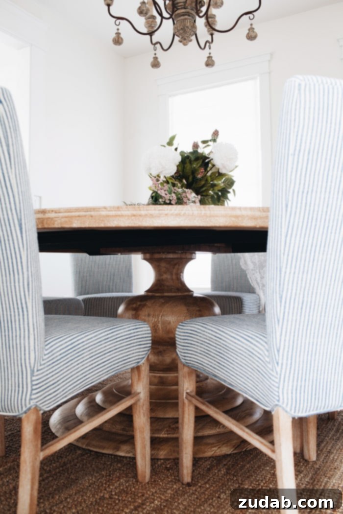 Chic Rustic Dining 18 Detailed shot illustrating the French Country Dining Room's elegance and comfort, with a focus on the dining set and surrounding decor.