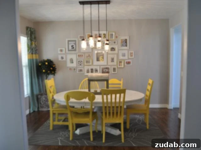 Before photo of a dining room with yellow chairs and a grey rug, awaiting a French Country transformation.