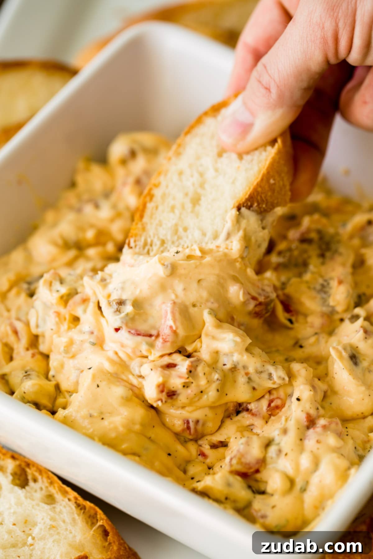 Creamy Cheesy Crockpot Sausage Dip 3 Cheesy slow cooker sausage dip with ranch! ohsweetbasil.com
