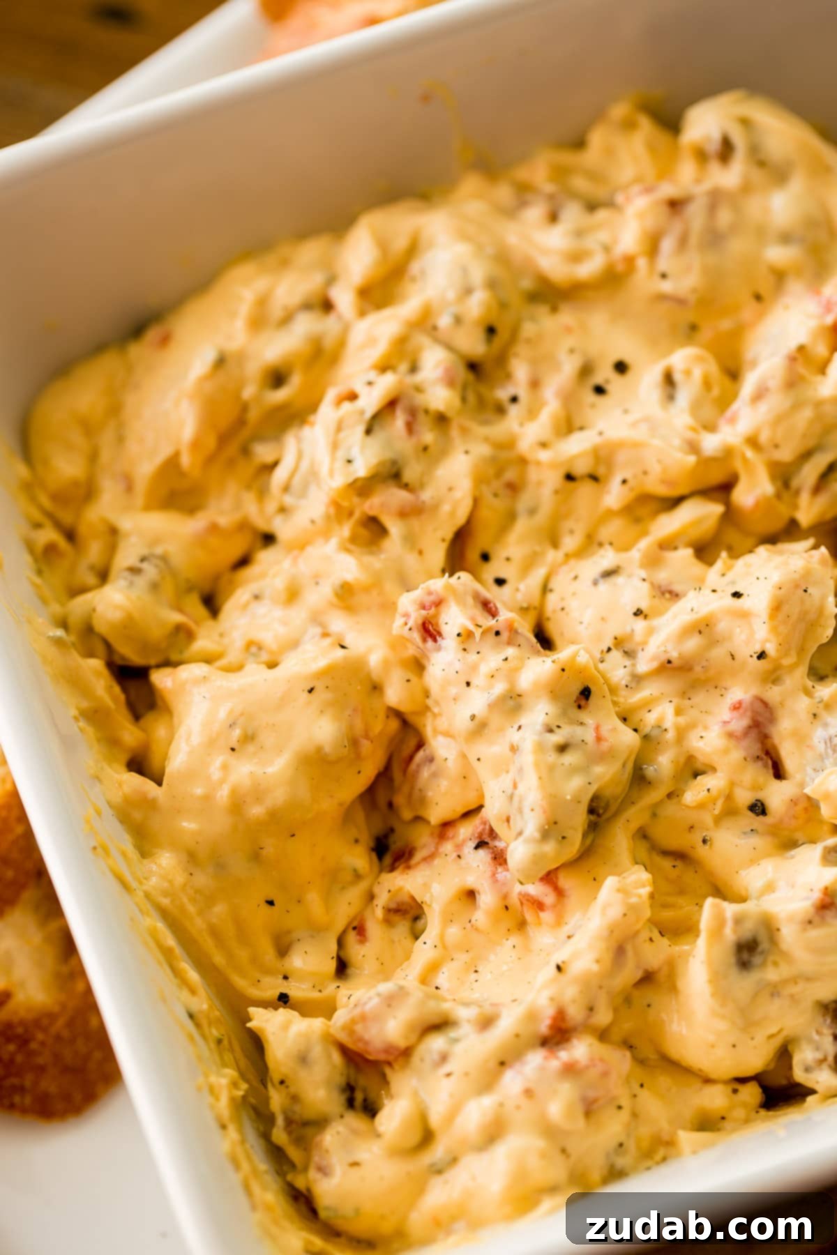 Creamy Cheesy Crockpot Sausage Dip 6 Throw tomatoes, ranch dip, cheese, cream cheese and sausage in a slow cooker and you've got cheesy slow cooker sausage dip! ohsweetbasil.com
