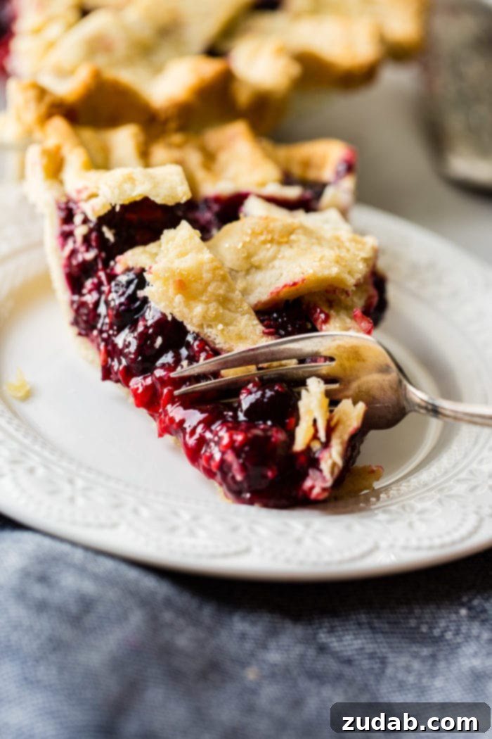 The Ultimate Razzleberry Pie 6 Freshly baked razzleberry pie, golden brown and bubbling, straight from the oven.