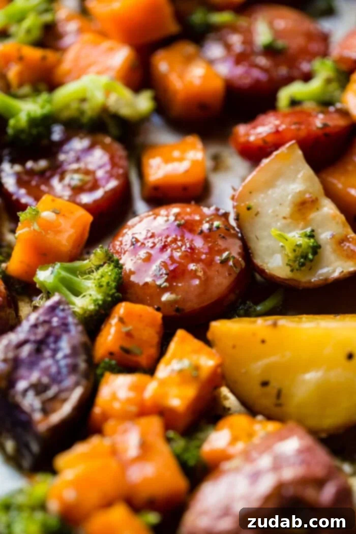 Sticky Honey Garlic Kielbasa Skillet 2 Sliced Honey Garlic Kielbasa, Roasted Potatoes, and Fresh Broccoli on a Sheet Pan, ready to serve for an easy weeknight dinner.