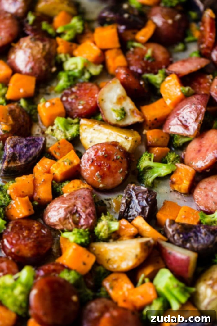 Sticky Honey Garlic Kielbasa Skillet 5 Roasted slices of Honey Garlic Kielbasa, golden potatoes, and bright green broccoli on a sheet pan, perfectly cooked.