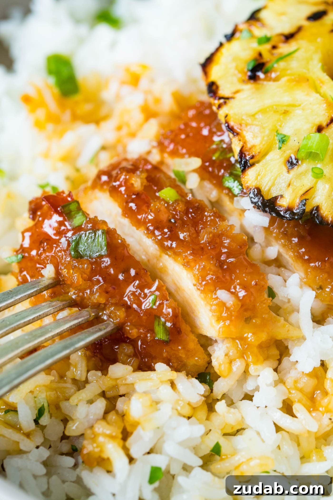 Speedy Sweet & Sour Pineapple Chicken 4 Delicious breaded chicken with sweet and sour sauce and grilled pineapple, ready to serve over rice