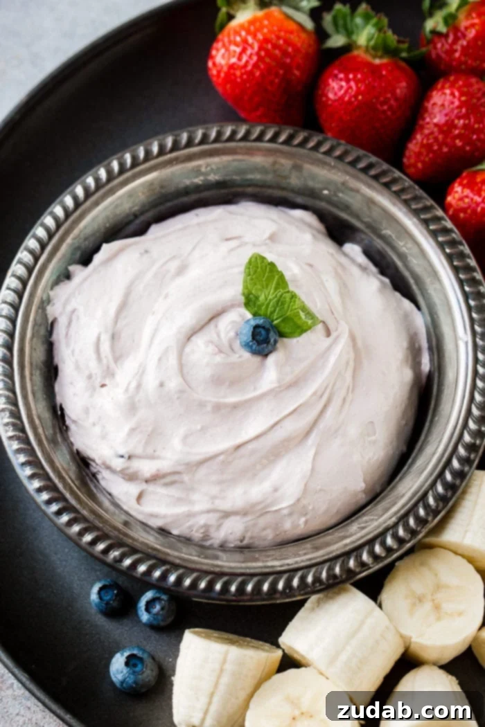 Blueberry Cloud Fruit Dip 3 This quick and easy blueberry fluff fruit dip from ohsweetbasil.com requires only 2 simple ingredients: cream cheese and marshmallow creme, making it an ideal last-minute party dessert or snack.