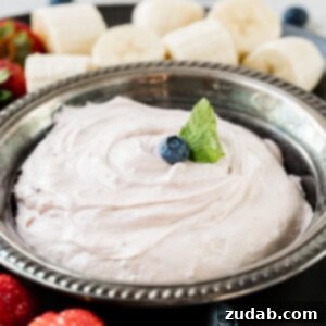 Looking for some spring recipes? We are going crazy for this blueberry fluff fruit dip and it only takes two ingredients, cream cheese and marshmallow creme!