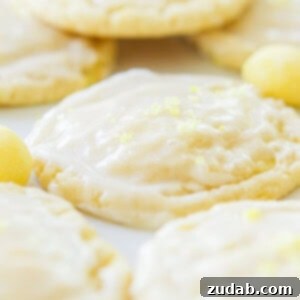 Zesty Lemon Drop Cookies 2 Soft and chewy lemon drop cookies with a light glaze and crushed lemon drops on top.
