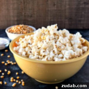 Tangy Salt and Vinegar Popcorn 8 Salt & Vinegar Popcorn - Fresh, homemade popcorn is tossed in sea salt and powdered vinegar to make for a healthy alternative to your favorite potato chip.