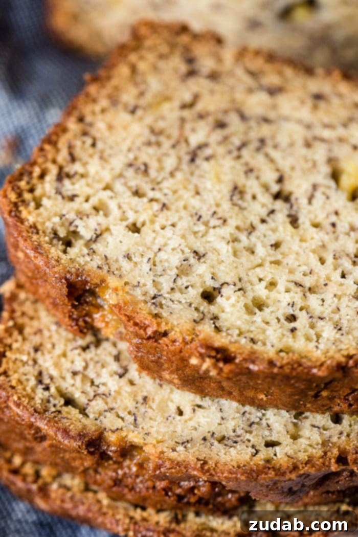 Irresistible Sour Cream Banana Bread 3 slices of sour cream banana bread stacked