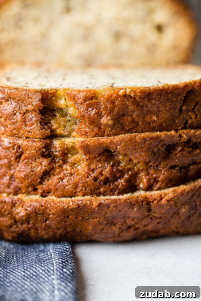 Irresistible Sour Cream Banana Bread 5 Slices of sour cream banana bread layered on top of each other