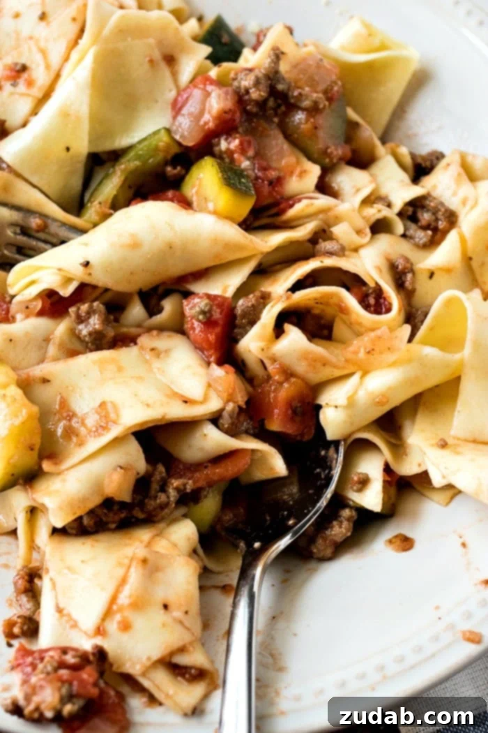 Simple & Satisfying Beef Ragu Pasta 9 Overhead shot of a delicious plate of beef ragu and pasta, beautifully plated and ready to enjoy.