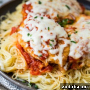 Speedy Weeknight Chicken Parmesan 8 A perfectly golden, crispy chicken parmesan cutlet topped with melted mozzarella and marinara sauce.