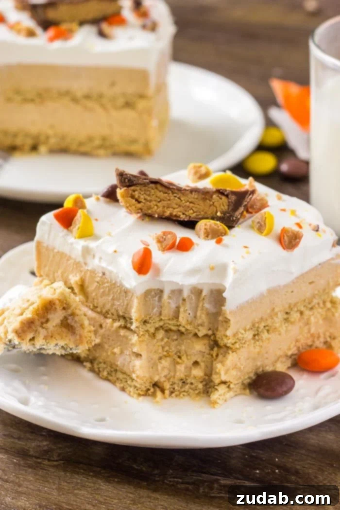 No-Bake Peanut Butter Dream 6 A beautiful slice of peanut butter icebox cake with rich, creamy layers, crowned with whipped topping and delicious peanut butter cups.