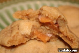Freshly baked Milky Way cookies on a cooling rack