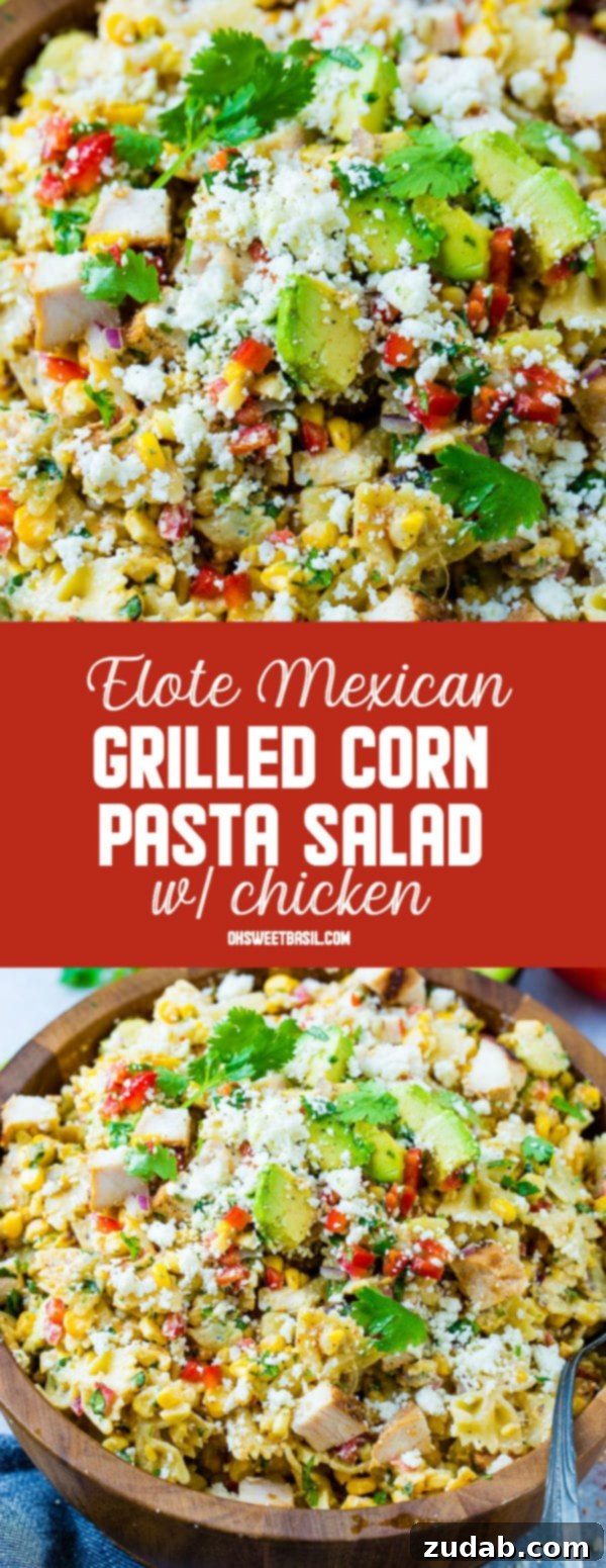 Zesty Elote Chicken Pasta Salad 7 A beautifully presented wooden bowl of Elote Mexican Grilled Corn Pasta Salad with Chicken, ready to be served, highlighting the fresh, vibrant ingredients.