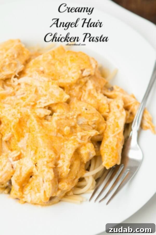 Creamy Angel Hair Chicken Pasta with a rich, savory sauce, ready to be served. Creamy Angel Hair Chicken Pasta with a rich, savory sauce, ready to be served.