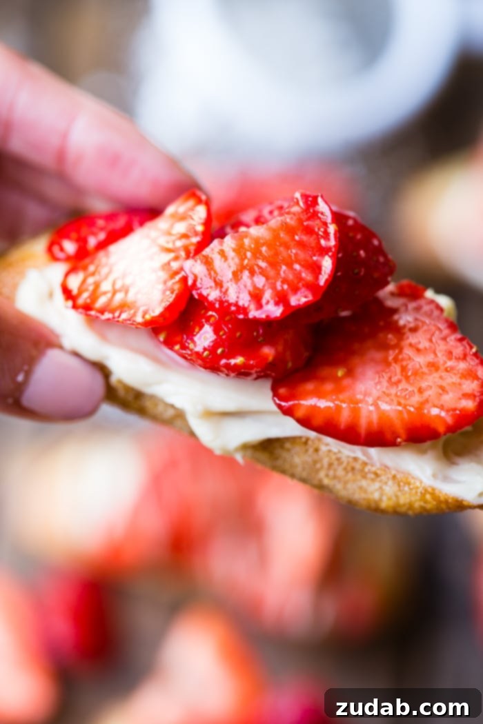 Brown Sugar Kissed Strawberry Crostini 7 A brown board with brown sugar strawberry crostinis