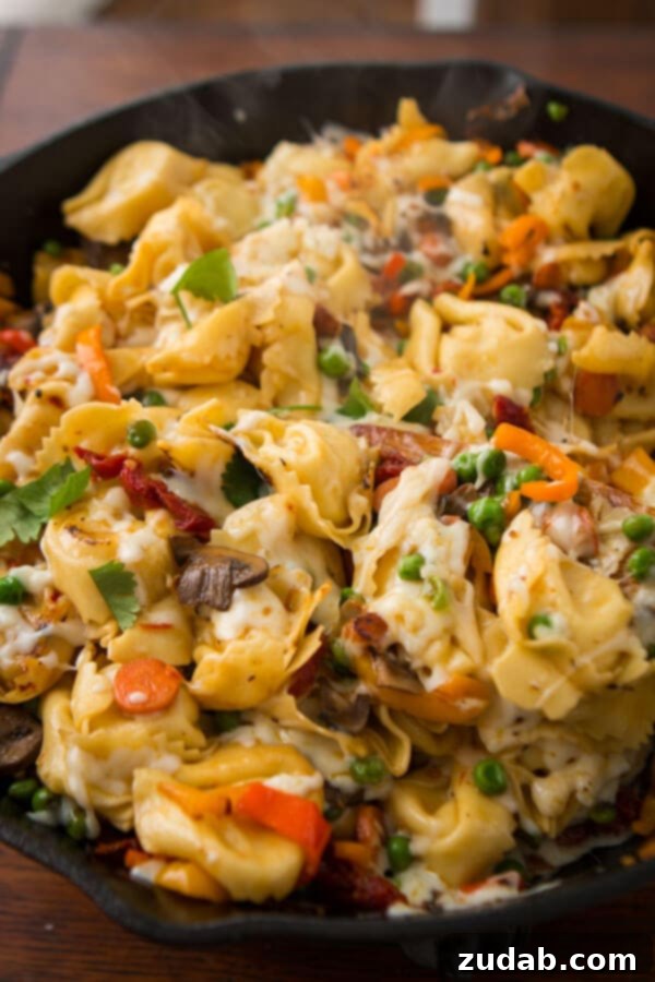 Golden Pan-Fried Cheesy Tortellini 3 This is one of our favorite dinners, cheesy pan fried tortellini. My husband made up the recipe and it looks almost too simple, but it's delicious!