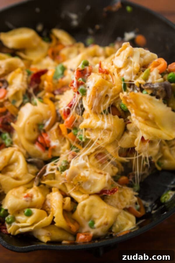 Golden Pan-Fried Cheesy Tortellini 4 This is one of our favorite dinners, cheesy pan fried tortellini. My husband made up the recipe and it looks almost too simple, but it's delicious!