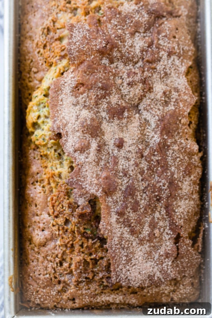 The Ultimate Zucchini Bread 2 A close up of the best zucchini bread recipe with cinnamon sugar topping