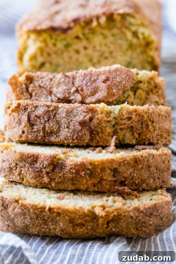 The Ultimate Zucchini Bread 3 A close up of the best zucchini bread recipe with cinnamon sugar topping