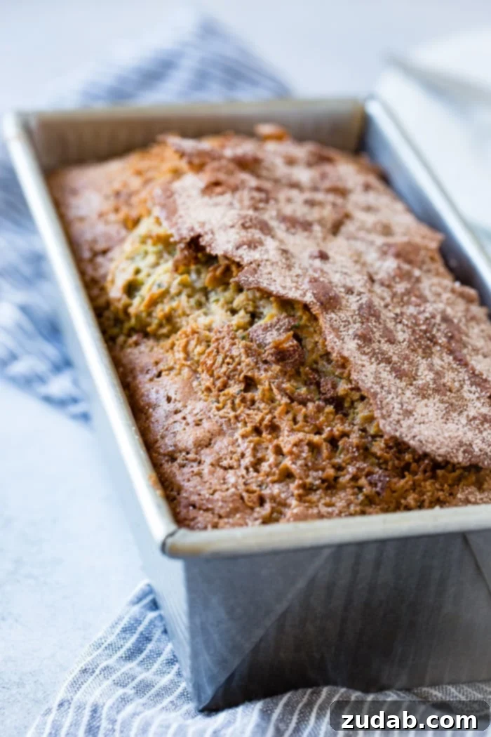 The Ultimate Zucchini Bread 4 A close up of the best zucchini bread recipe with cinnamon sugar topping