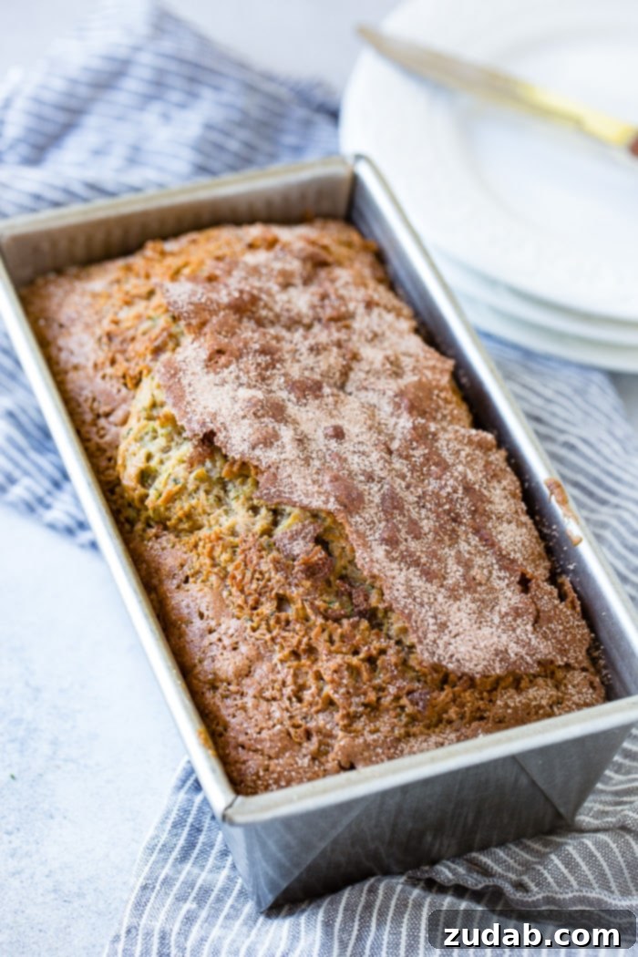 The Ultimate Zucchini Bread 6 a loaf of moist zucchini bread in bread pan