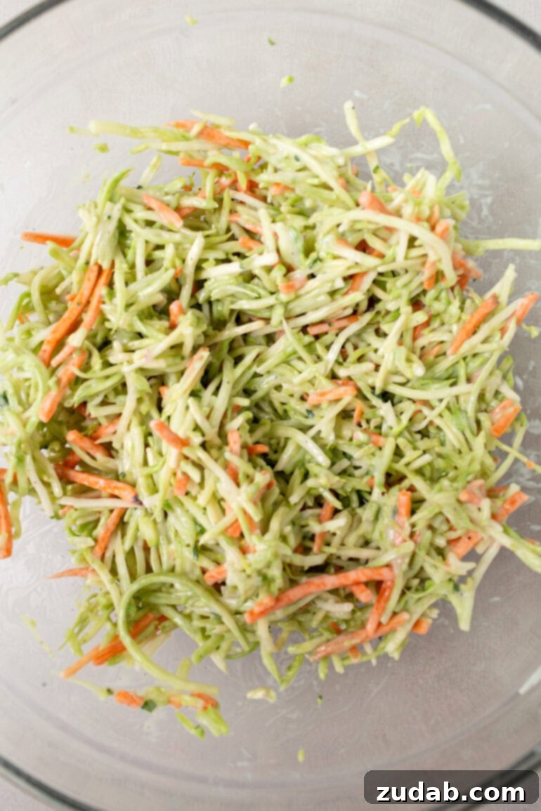 Step-by-step image showing peeled carrots next to shredded broccoli stems and carrots, illustrating the preparation process for broccoli slaw.