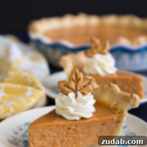 Sweet Potato Cheesecake Pie 2 Sweet potato pie slices on plates, with a perfect creamy filling and golden crust.