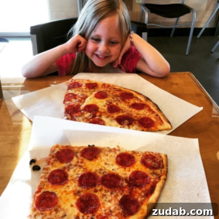 Unforgettable Father Daughter Moments 4 Delicious pizza being served at a restaurant