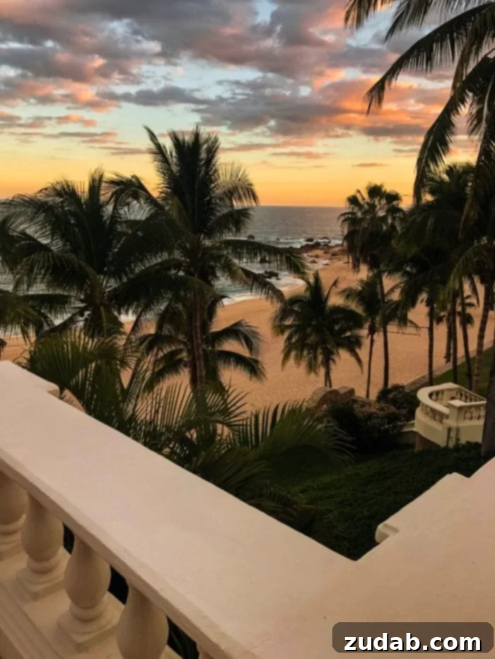 Unlock Mexico's Best Stays 2 Stunning sunset view over a pristine beach with silhouetted palm trees in San Jose del Cabo, Mexico