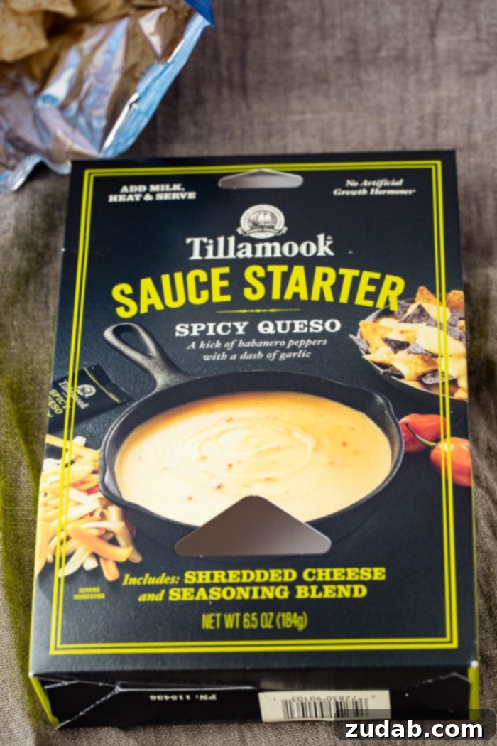Ultimate Slow Cooker Taco Dip 3 A photo of a package of Tillamook Spicy Queso Sauce Starter.