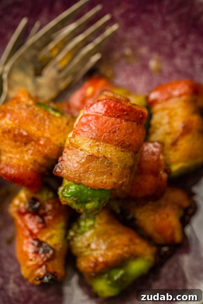 Crispy Bacon Avocado Bites 6 This Bacon Wrapped Avocados appetizer recipe is sure to win over everyone you know.Crispy brown sugar bacon wrapped around a creamy avocado, and it's easy!