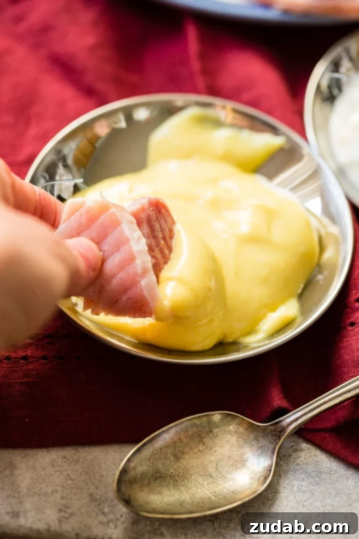 Simple Sauces That Make Ham Shine 6 A close-up of a small dish filled with golden Honey Mustard, ready to be enjoyed with spiral ham. This sauce is touted as the best, enhancing the flavor of ham dishes.