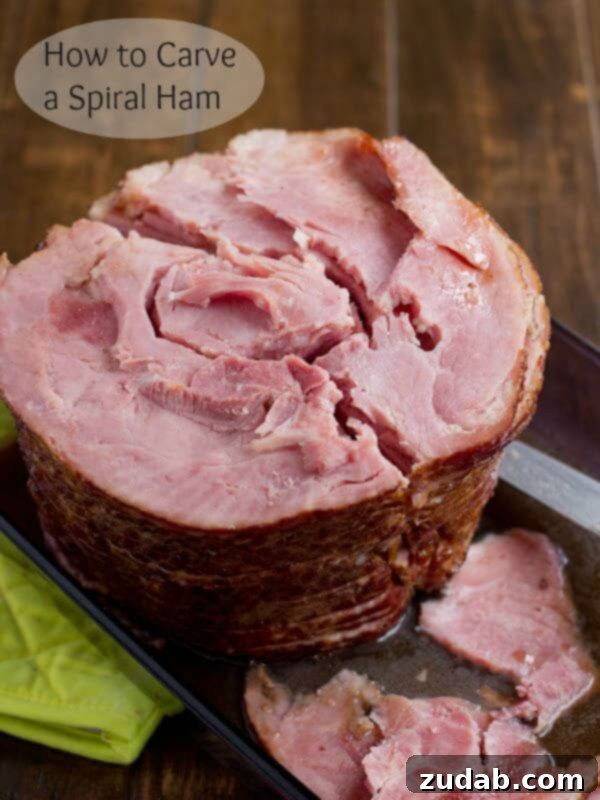 A photo taken of a spiral cut ham on its backside with the bone cut out. 