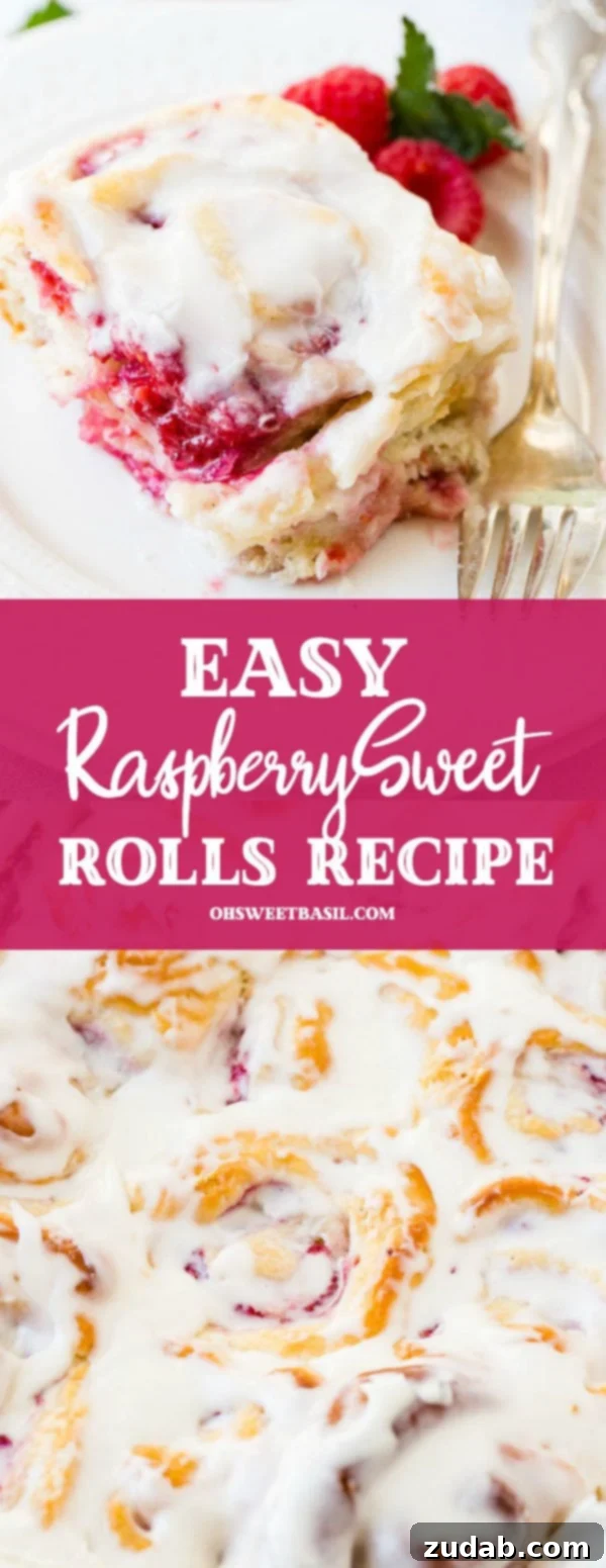 Effortless Raspberry Sweet Rolls 10 A frosted easy berry sweet roll on a white plate with a fork laying beside it and fresh raspberries next to it.