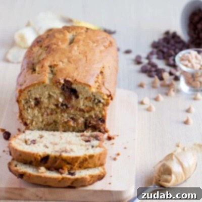 2012's Flavorful Favorites 9 Slices of moist Peanut Butter Banana Bread, showing the golden crust and soft interior with banana chunks.