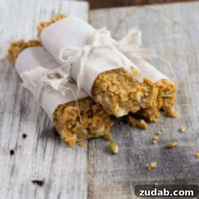2012's Flavorful Favorites 3 Homemade Pumpkin Spice Granola Bars, cut into rectangles, showing oats, nuts, and spices.