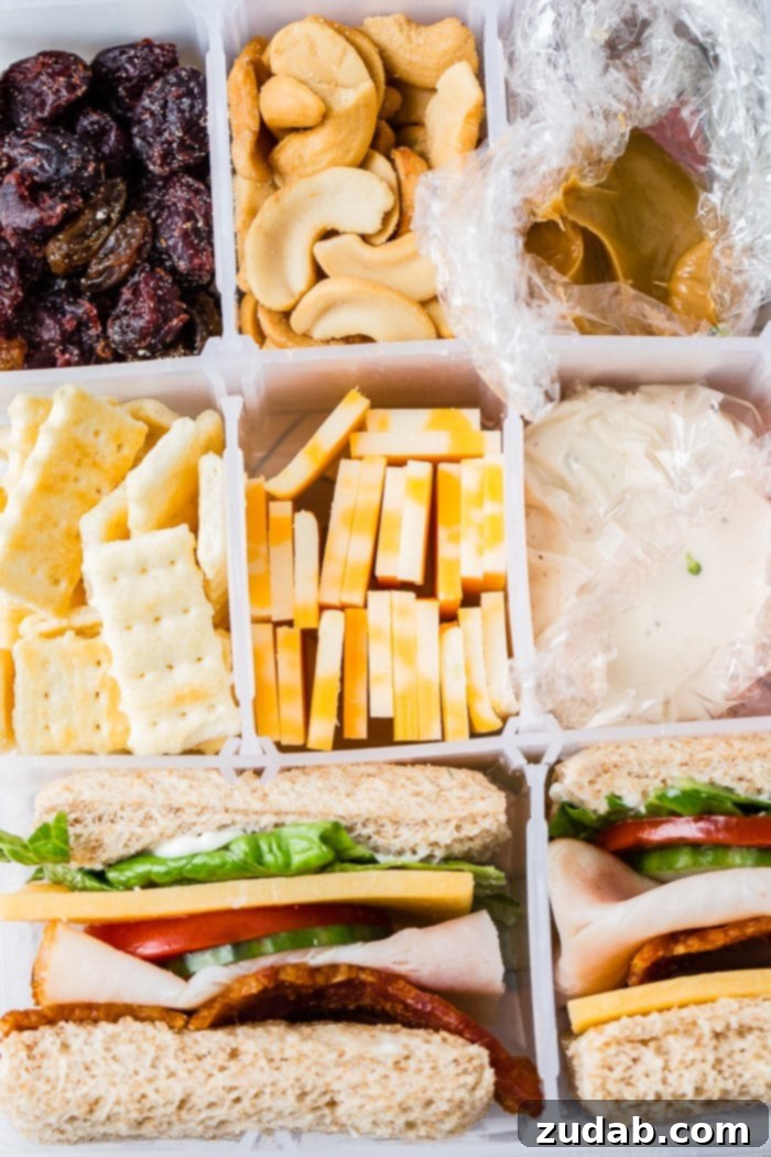 Road Trip Ready Snacks and Entertainment Solutions 4 A close-up view of a craft box, typically utilized for beads or other crafting supplies, now ingeniously filled with an assortment of healthy and delicious snacks. The compartments are neatly arranged with various nuts, premium cheese slices, wholesome crackers, and fresh fruits, showcasing a well-organized and nutritious road trip snack box.