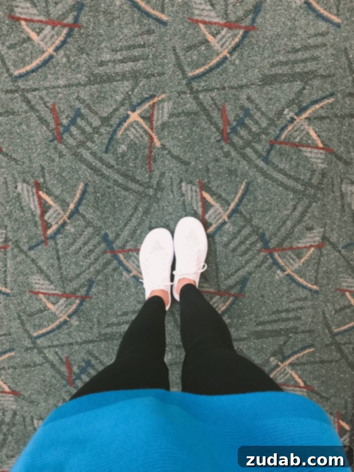 Road Trip Ready Snacks and Entertainment Solutions 10 A detailed close-up of the iconic Portland Oregon airport carpet, showcasing its distinctive geometric pattern and vibrant color scheme. This famous carpet serves as a nostalgic landmark for many travelers.