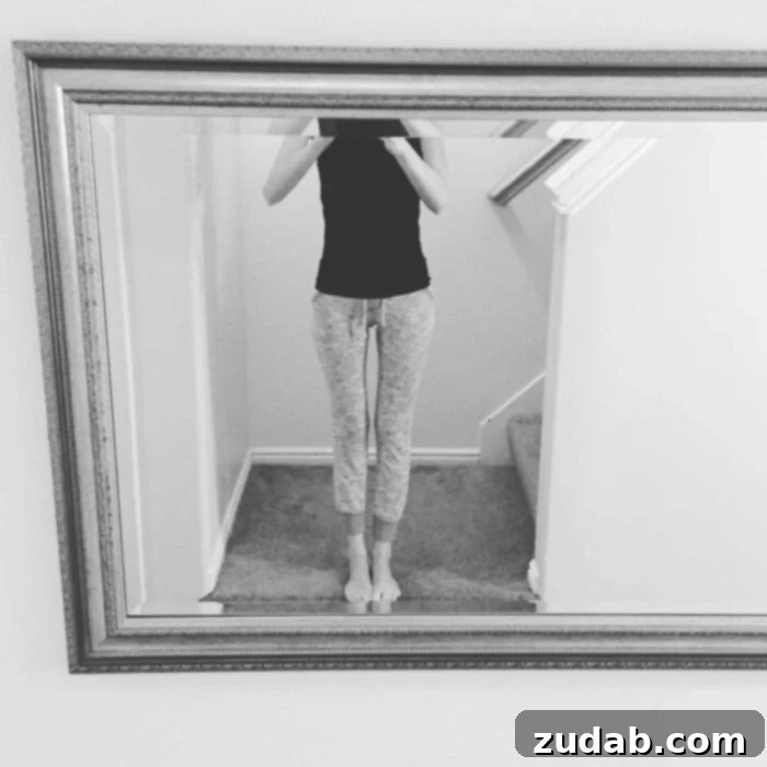 A mirror selfie of a person at 78 pounds, reflecting a critical moment of physical fragility and resilience during a health crisis.