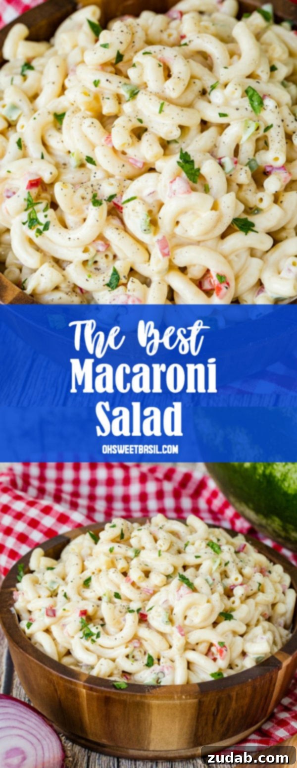 The Ultimate Macaroni Pasta Salad Recipe 8 A wooden bowl on a red and white checkered napkin full of creamy macaroni salad.
