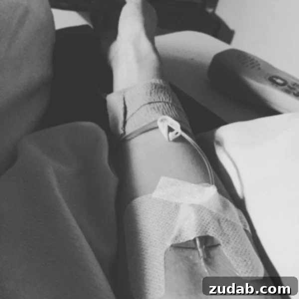 Chapter Fifteen: Enduring Faith in the Abyss 4 A photo of my arm with an IV in it, symbolizing vulnerability, medical intervention, and reliance on trust.