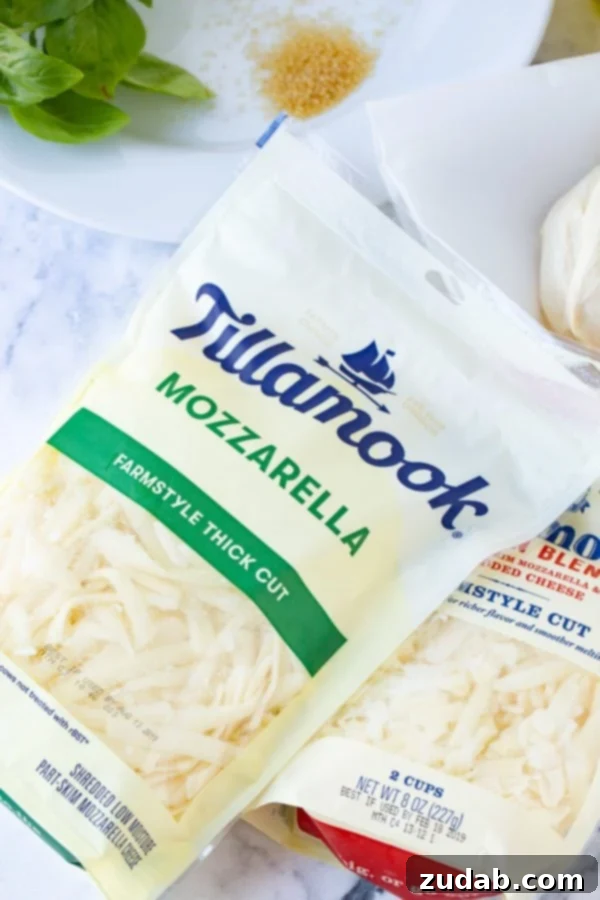 Tillamook Mozzarella Farmstyle Thick Cut Cheese - Oh Sweet Basil A picture of a package of Tillamook mozarella cheese used for grilled pizza.