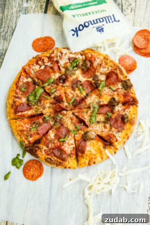 Grilled Pesto Pizza with Pepperoni and Sausage 4 A photo of a pesto pepperoni grilled pizza.