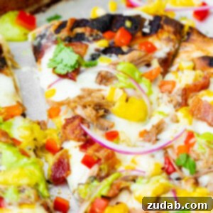 Delicious Pulled Pork Pizza with Sweet Corn and Cilantro Cream