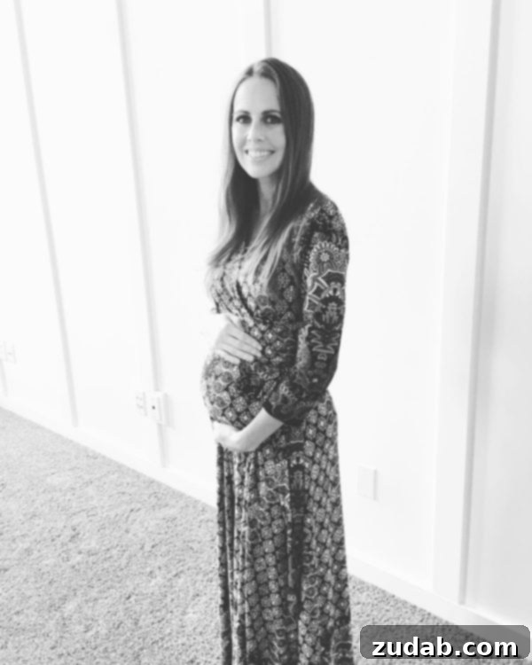 A photo of me 8 months pregnant.