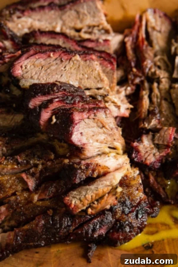 Perfect Smoked Brisket Recipe A photo of perfectly smoked beef brisket sliced and ready to devour.