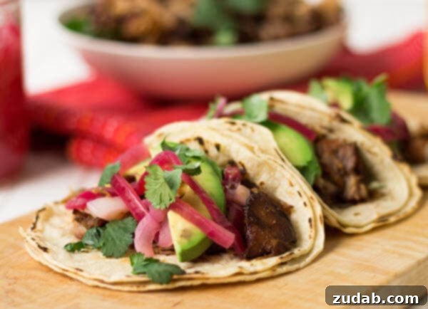 carnitas taco bar ohsweetbasil.com Pork carnitas with pickled red onions ohsweetbasil.com